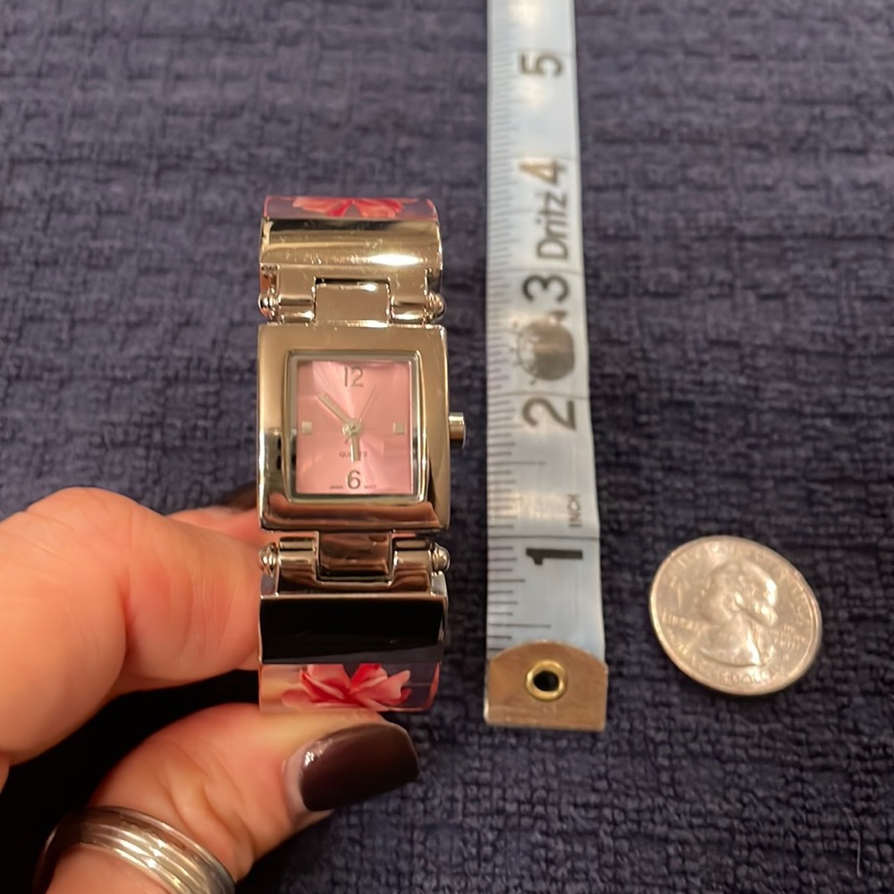 Watch with clear acrylic band with rose motif